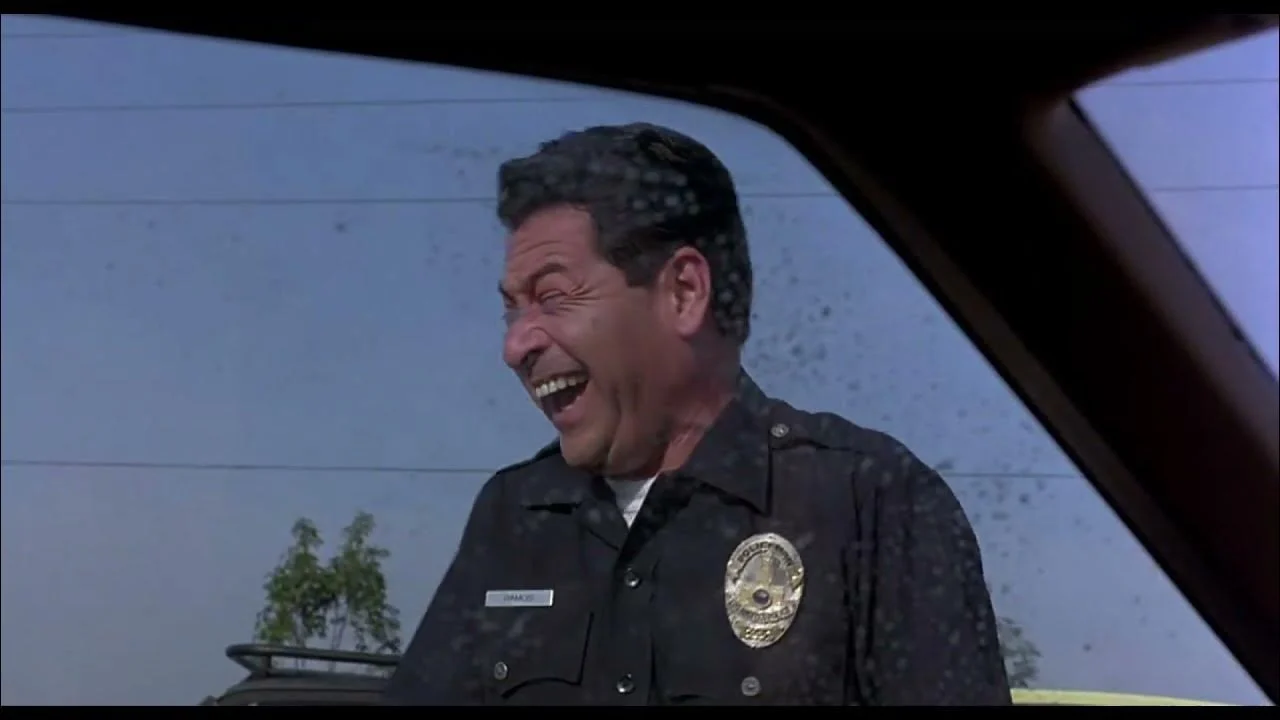 Auto Circus Cop (The Big Lebowski) (Mike Gomez)
