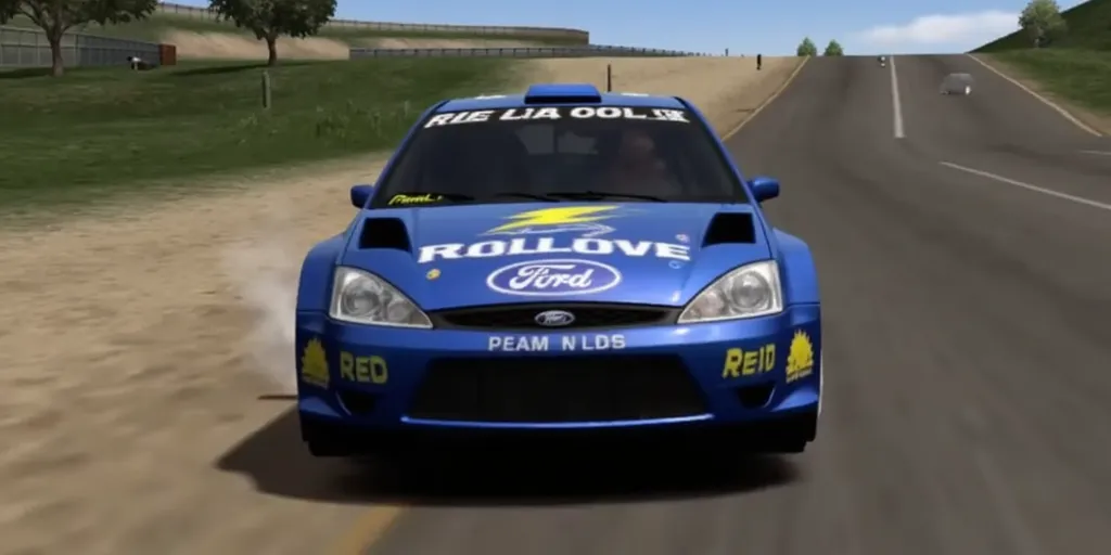 ps1 screencap of 2003 Ford Focus WRC rally car with This user needs buzz! branding with lightning symbols and Ford branding, front view