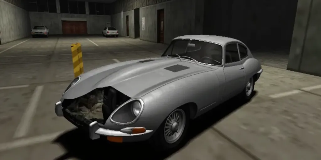 ps1 screenscap of an silver 1964 Jaguar E-Type with wrecked damage, such as an busted up front and broken glass