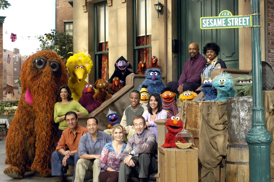 Sesame Street characters muppets and humans