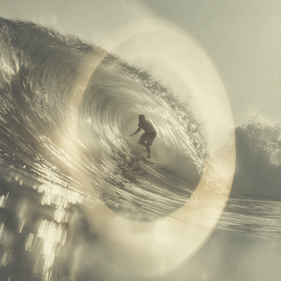 A surfer riding an enormous wave, suspended in perfect balance as the massive curl of water forms a tunnel around them, with ocean spray catching sunlight
