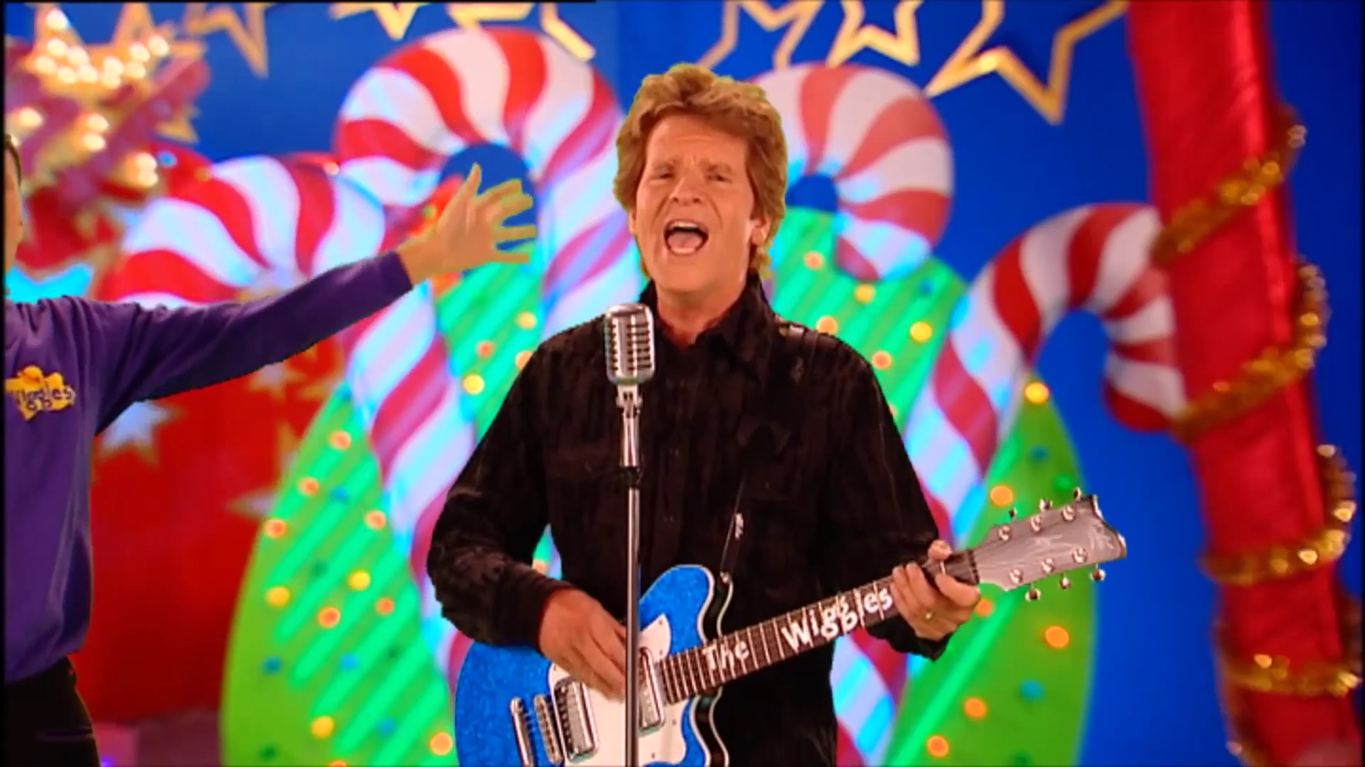 John Fogerty (the wiggles Santa's rockin)